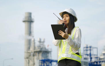 Woman working at the electric power industry